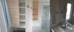 a white bathroom with a shower and a sink at Camping 2 étoiles - Piscine - ccbfida in Vernet-les-Bains