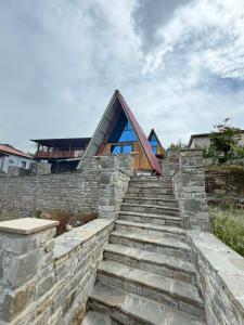 a stone stairway leading up to a house at The Canyon House in Çuadar