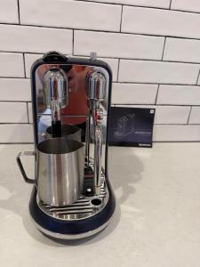 a coffee maker sitting on a kitchen counter at The beach & wine pad in Port Willunga