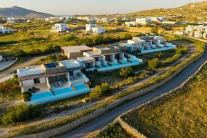 an aerial view of a row of houses on a road at Aegean Hospitality in Mikonos
