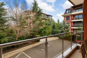 an apartment balcony with a view of trees at Top 10 3BR2BH Jacuzzi Free Parking in Sofia