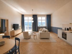 a living room with a couch and a table at stuub schluchsee in Schluchsee