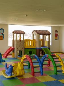 a childs play room with many different types of toys at Hyatt Place Haridwar in Haridwār