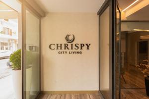 Un certificat, premiu, logo sau alt document afișat la Chrispy City Living ex Nefeli