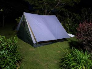 a tent sitting on the grass in a garden at Glamping by CampingLyfe in Bandarawela