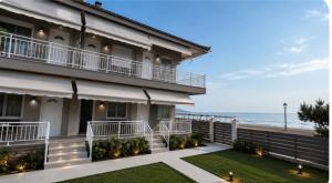 a building with a view of the ocean at Basilio's Studios in Leptokarya