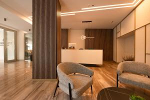 O zonă de relaxare la Chrispy City Living ex Nefeli +18 fotografii