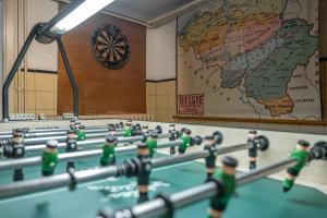 a group of lego men playing chess in a room with a map at Bonnie's Beachhouse - villa aan zee in De Panne