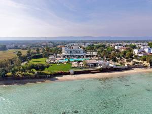 an aerial view of a house on the beach at Canne Bianche Lifestyle Hotel in Torre Canne