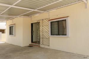 an empty building with a window on the side of it at Ananda Villa in Igatpuri +2 photos