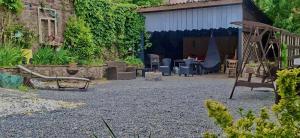 a yard with a playground and a swing at Ferienwohnung Lebensbaum in Trimberg in Elfershausen