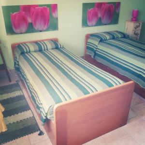 Una cama o camas en una habitación de I 99 ulivi