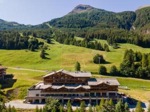 an aerial view of a lodge in the mountains at Hôtel Saint Charles Val Cenis in Lanslebourg-Mont-Cenis