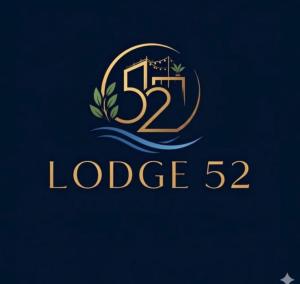 a gold logo on a blue background at Lodge 52 in Negombo