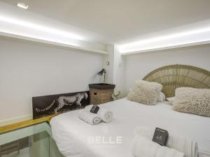 a bedroom with two beds with towels on them at Rocher - 3min Port Hercule - Casino in Monte Carlo