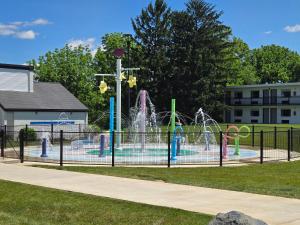 a playground with a water park with a fountain at Dutch Wonderland Inn in Lancaster
