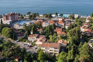 an aerial view of a resort town with the ocean at Green Oasis by the Sea in Koper +6 photos
