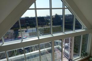 a view from the top of a building with windows at Spacious and bright 125m2 apartment in Berck in Berck-sur-Mer +2 photos