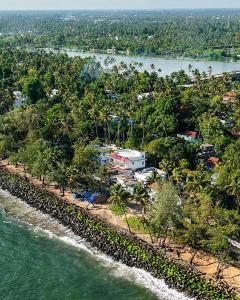 an aerial view of the shoreline of a resort at Palm Beach View Resort Cherai in Cherai Beach +33 photos