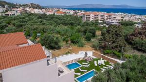 an aerial view of a villa with a swimming pool at Casa Eda in Agia Marina Nea Kydonias