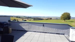 a view from the balcony of a house at Eifel Dream Ardennenblick in Kobscheid