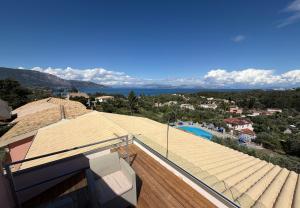 a view from the roof of a house at Penelope Apartment Hotel in Dassia