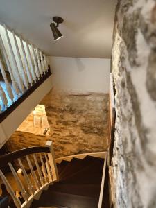 a view of a staircase in a house at Karja Castle Apartments in Haapsalu +10 photos