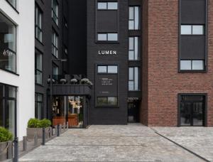 a rendering of the front of a building at Lumen Living in Kyiv