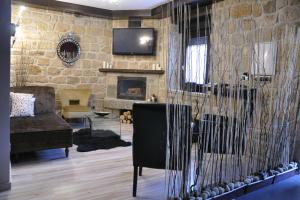TV a/nebo společenská místnost v ubytování Posada Dos Aguas