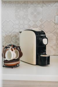 a toaster sitting on top of a kitchen counter at Casa Anastasia Beach Loft in Montesilvano