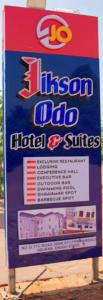 a sign for a hitzonillaillaachiachiachiachiachi at Jiksonodohotel in Nsukka