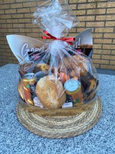 a basket filled with different types of bread at A&S City Hotel am Rosenpark in Aachen