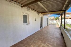 an empty patio with awning on a building at Hulot-838-Iodine parenthesis in Frontignan