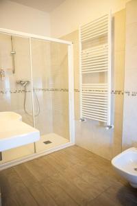 a bathroom with a shower and a sink at Albergo La Veranda in Tavarone +48 photos