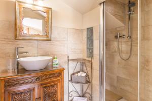 a bathroom with a sink and a shower at Casa Aloe B&B in Monte San Savino