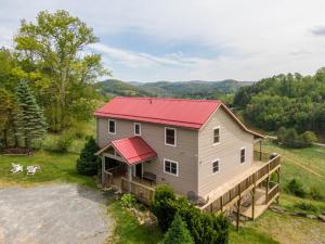 an aerial view of a house with a red roof at Rosey Outlook in Boone