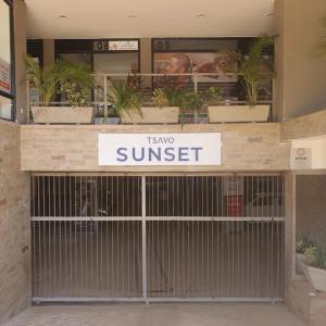 a sign that reads tempo sunset on the front of a building at Urban Haven Homes in Kiambu