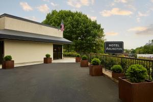 a hotel activation sign in front of a building at Hotel Arlington in Arlington