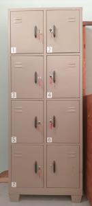 a tall white dresser with nine drawers with lockets at Surfers Park Arugambay in Arugam Bay
