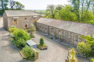 an overhead view of a building with plants and trees at The Wagon in Michaelstow