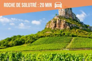 a mountain with a car parked on top of it at Le Fonctionnel - Central in Mâcon