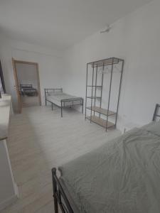 a room with two beds and a mirror at Apartment Wesel in Wesel