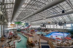 a large indoor water park with a large swimming pool at Jay Peak Getaway on Trout River in Montgomery