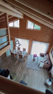 a view of a living room in a log cabin at Ferienhaus Romantika in Wertheim