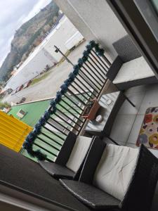 a view from a window of a living room with chairs at Departamento Temuco in Temuco