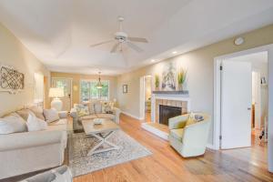 a living room with a couch and a fireplace at Inlet Cove 94 in Kiawah Island