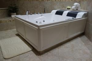 A bathroom at Sybaris Pool Suites Northbrook - Adults Only