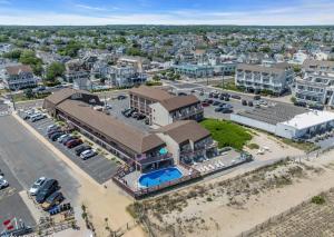 an aerial view of a town with a parking lot at Windswept Motel in Point Pleasant Beach