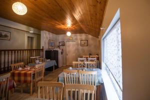 a restaurant with tables and chairs in a room at Kerrigan's B&B in Mullingar
