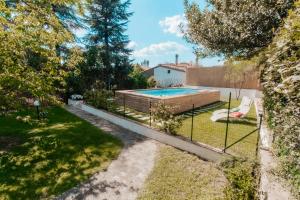 an overhead view of a backyard with a swimming pool at DONNA LAURA - Holiday Home in Arezzo